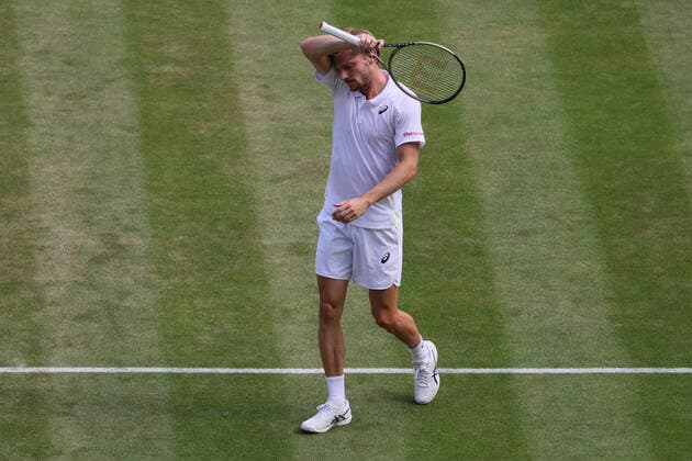 Belgian David Goffin reacts during a tennis match between Belgian Goffin and UK Norrie in the 1 8 finals of the men s singles tournament at the 2022 Wimbledon grand slam tennis tournament at the All England Tennis Club, in south-west London, Britain, Tuesday 05 July 2022. BENOITxDOPPAGNE  x37033506x