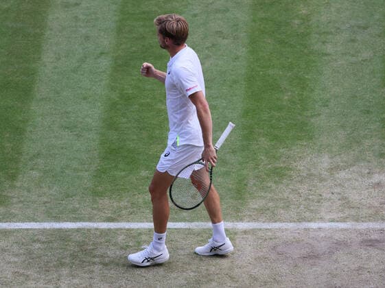 Belgian David Goffin reacts during a tennis match between Belgian Goffin and UK Norrie in the 1 8 finals of the men s singles tournament at the 2022 Wimbledon grand slam tennis tournament at the All England Tennis Club, in south-west London, Britain, Tuesday 05 July 2022. BENOITxDOPPAGNE  x37033603x