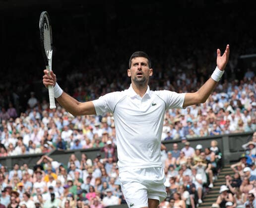 Serbian Novak Djokovic in action in his Quarter-Final match against Italian Jannik Sinner on day nine of the 2022 Wimbledon championships in London onTuesday, July 05, 2022.  LON2022070533 HUGOxPHILPOTT