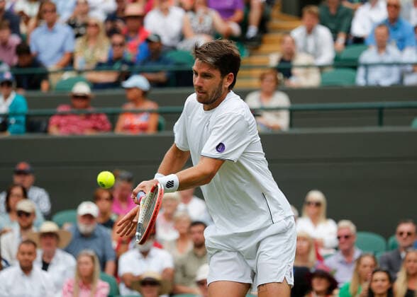 5th July 2022, All England Lawn Tennis and Croquet Club, London, England; Wimbledon Tennis tournament; Cameron Norrie (GBR) plays a forehand to David Goffin (BEL)  ActionPlus12405310 JohnxPatrickxFletcher