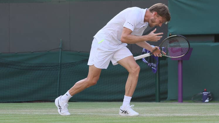 Belgian David Goffin reacts during a tennis match against UK Norrie in the 1 8 finals of the men s singles tournament at the 2022 Wimbledon grand slam tennis tournament at the All England Tennis Club, in south-west London, Britain, Tuesday 05 July 2022. BENOITxDOPPAGNE  x37040943x