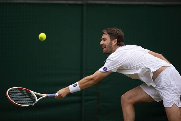 Mandatory Credit: Photo by Ella Ling Shutterstock (13012864dq) Cameron Norrie during his quarter final match Wimbledon Tennis Championships, Day 9, The All England Lawn Tennis and Croquet Club, London, UK - 05 Jul 2022 Wimbledon Tennis Championships, Day 9, The All England Lawn Tennis and Croquet Club, London, UK - 05 Jul 2022  Copyright: xEllaxLing Shutterstockx 13012864dq
