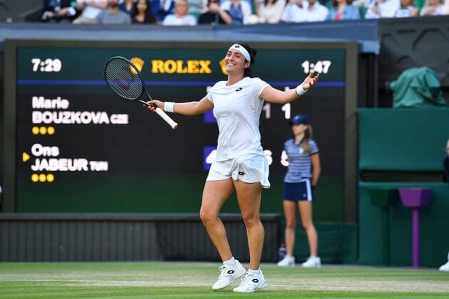 Mandatory Credit: Photo by James Veysey Shutterstock (13012868hn) Ons Jabeur celebrates after winning her quarter final match Wimbledon Tennis Championships, Day 9, The All England Lawn Tennis and Croquet Club, London, UK - 05 Jul 2022 Wimbledon Tennis Championships, Day 9, The All England Lawn Tennis and Croquet Club, London, UK - 05 Jul 2022  Copyright: xJamesxVeysey Shutterstockx 13012868hn