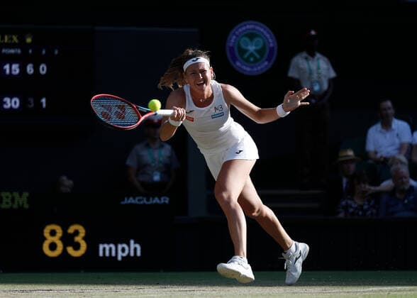 5th July 2022, All England Lawn Tennis and Croquet Club, London, England; Wimbledon Tennis tournament; Marie Bouzkova (CZE) plays a forehand to Ons Jabeur (TUN)  ActionPlus12405346 JohnxPatrickxFletcher