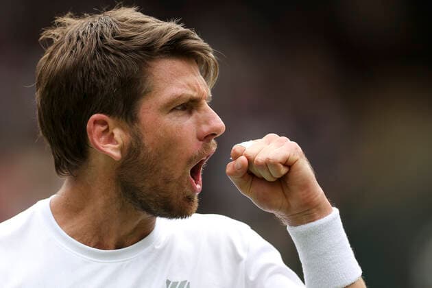 (220706) -- LONDON, July 6, 2022 -- Cameron Norrie of Britain celebrates during the men s singles quarter-final match against David Goffin of Belgium at Wimbledon Tennis Championship in London, Britain, on July 5, 2022. ) (SP)BRITAIN-LONDON-TENNIS-WIMBLEDON-MEN S SINGLES-QUARTERFINALS HanxYan 