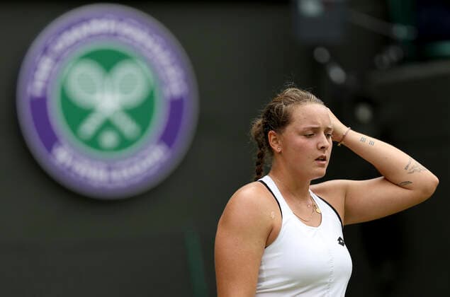 (220706) -- LONDON, July 6, 2022 -- Jule Niemeier of Germany reacts during the women s singles quarter-final match against her compatriot Tatjana Maria at Wimbledon Tennis Championship in London, Britain, on July 5, 2022. ) (SP)BRITAIN-LONDON-TENNIS-WIMBLEDON-WOMEN S SINGLES-QUARTERFINALS HanxYan 