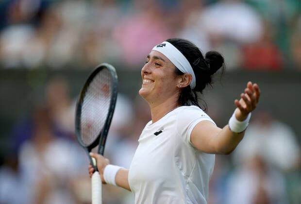 (220706) -- LONDON, July 6, 2022 -- Ons Jabeur of Tunisia celebrates after winning the women s singles quarter-final match against Marie Bouzkova of the Czech Republic at Wimbledon Tennis Championship in London, Britain, on July 5, 2022. ) (SP)BRITAIN-LONDON-TENNIS-WIMBLEDON-WOMEN S SINGLES-QUARTERFINALS LixYing 