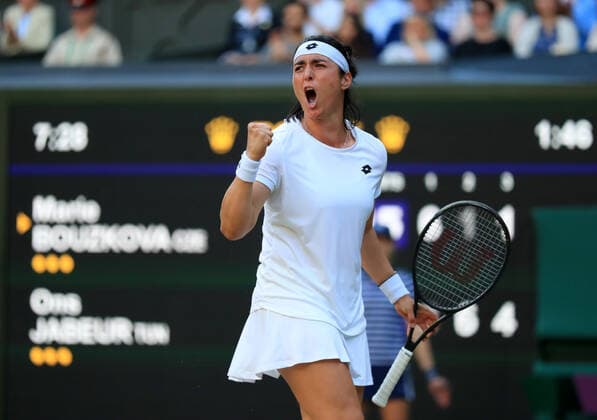 (220706) -- LONDON, July 6, 2022 -- Ons Jabeur of Tunisia celebrates during the women s singles quarter-final match against Marie Bouzkova of the Czech Republic at Wimbledon Tennis Championship in London, Britain, on July 5, 2022. ) (SP)BRITAIN-LONDON-TENNIS-WIMBLEDON-WOMEN S SINGLES-QUARTERFINALS LixYing 