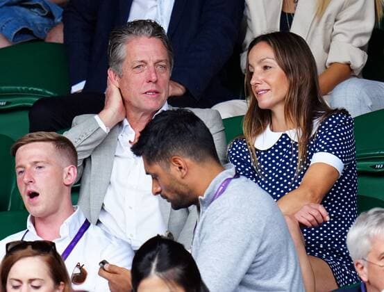 Mandatory Credit: Photo by Javier Garcia Shutterstock (13018042bs) Hugh Grant and Anna Elisabet Eberstein watching the action on Centre Court Wimbledon Tennis Championships, Day 10, The All England Lawn Tennis and Croquet Club, London, UK - 06 Jul 2022 Wimbledon Tennis Championships, Day 10, The All England Lawn Tennis and Croquet Club, London, UK - 06 Jul 2022  Copyright: xJavierxGarcia Shutterstockx 13018042bs