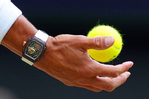 Mandatory Credit: Photo by Javier Garcia Shutterstock (13018042em) The hand and watch of Rafael Nadal holding a tennis ball during his quarter-final match Wimbledon Tennis Championships, Day 10, The All England Lawn Tennis and Croquet Club, London, UK - 06 Jul 2022 Wimbledon Tennis Championships, Day 10, The All England Lawn Tennis and Croquet Club, London, UK - 06 Jul 2022  Copyright: xJavierxGarcia Shutterstockx 13018042em