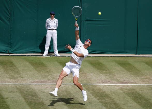 6th July 2022, All England Lawn Tennis and Croquet Club, London, England; Wimbledon Tennis tournament; Filip Polasek (SVK) plays a forehand to Matthew Ebden (AUS)  ActionPlus12405413 JohnxPatrickxFletcher