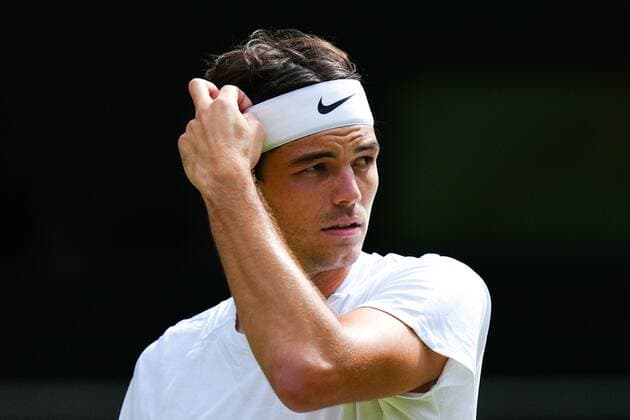 Mandatory Credit: Photo by Javier Garcia Shutterstock (13018042ga) Taylor Fritz during his quarter-final match Wimbledon Tennis Championships, Day 10, The All England Lawn Tennis and Croquet Club, London, UK - 06 Jul 2022 Wimbledon Tennis Championships, Day 10, The All England Lawn Tennis and Croquet Club, London, UK - 06 Jul 2022  Copyright: xJavierxGarcia Shutterstockx 13018042ga