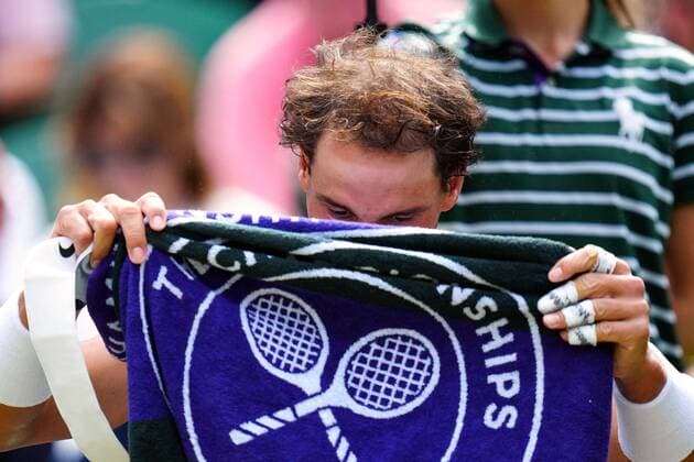 Mandatory Credit: Photo by Javier Garcia Shutterstock (13018042gi) Rafael Nadal with a Wimbledon towel during his quarter-final match Wimbledon Tennis Championships, Day 10, The All England Lawn Tennis and Croquet Club, London, UK - 06 Jul 2022 Wimbledon Tennis Championships, Day 10, The All England Lawn Tennis and Croquet Club, London, UK - 06 Jul 2022  Copyright: xJavierxGarcia Shutterstockx 13018042gi