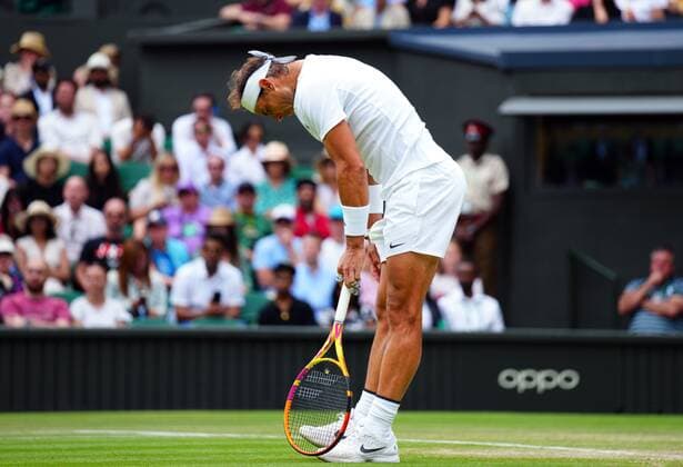 Mandatory Credit: Photo by Javier Garcia Shutterstock (13018042gr) Rafael Nadal dejected during his quarter-final match Wimbledon Tennis Championships, Day 10, The All England Lawn Tennis and Croquet Club, London, UK - 06 Jul 2022 Wimbledon Tennis Championships, Day 10, The All England Lawn Tennis and Croquet Club, London, UK - 06 Jul 2022  Copyright: xJavierxGarcia Shutterstockx 13018042gr