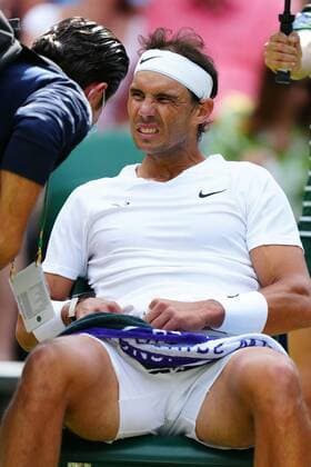 Mandatory Credit: Photo by Javier Garcia Shutterstock (13018042gs) Rafael Nadal takes a time out for a stomach muscle complaint during his quarter-final match Wimbledon Tennis Championships, Day 10, The All England Lawn Tennis and Croquet Club, London, UK - 06 Jul 2022 Wimbledon Tennis Championships, Day 10, The All England Lawn Tennis and Croquet Club, London, UK - 06 Jul 2022  Copyright: xJavierxGarcia Shutterstockx 13018042gs