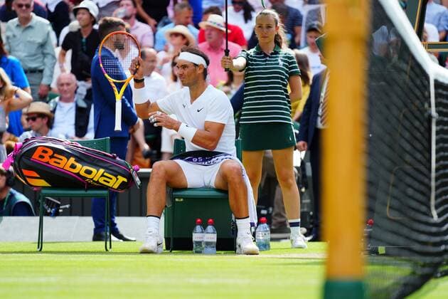 Mandatory Credit: Photo by Javier Garcia Shutterstock (13018042hg) Rafael Nadal takes a medical time out for a stomach muscle complaint during his quarter-final match Wimbledon Tennis Championships, Day 10, The All England Lawn Tennis and Croquet Club, London, UK - 06 Jul 2022 Wimbledon Tennis Championships, Day 10, The All England Lawn Tennis and Croquet Club, London, UK - 06 Jul 2022  Copyright: xJavierxGarcia Shutterstockx 13018042hg