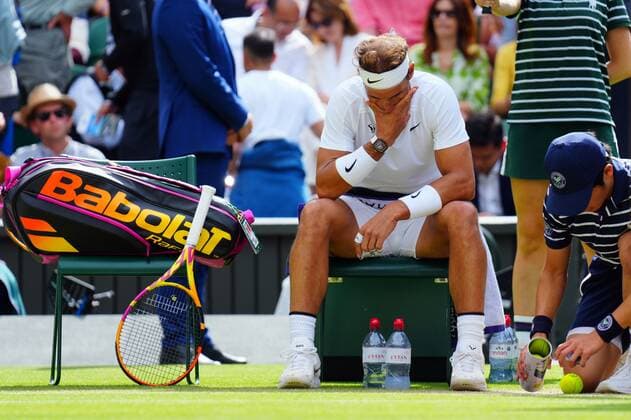 Mandatory Credit: Photo by Javier Garcia Shutterstock (13018042hd) Rafael Nadal takes a medical time out for a stomach muscle complaint during his quarter-final match Wimbledon Tennis Championships, Day 10, The All England Lawn Tennis and Croquet Club, London, UK - 06 Jul 2022 Wimbledon Tennis Championships, Day 10, The All England Lawn Tennis and Croquet Club, London, UK - 06 Jul 2022  Copyright: xJavierxGarcia Shutterstockx 13018042hd