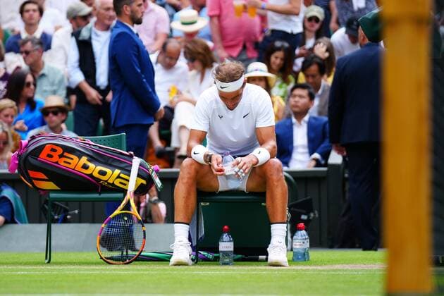 Mandatory Credit: Photo by Javier Garcia Shutterstock (13018042hp) Rafael Nadal between games during his quarter-final match Wimbledon Tennis Championships, Day 10, The All England Lawn Tennis and Croquet Club, London, UK - 06 Jul 2022 Wimbledon Tennis Championships, Day 10, The All England Lawn Tennis and Croquet Club, London, UK - 06 Jul 2022  Copyright: xJavierxGarcia Shutterstockx 13018042hp