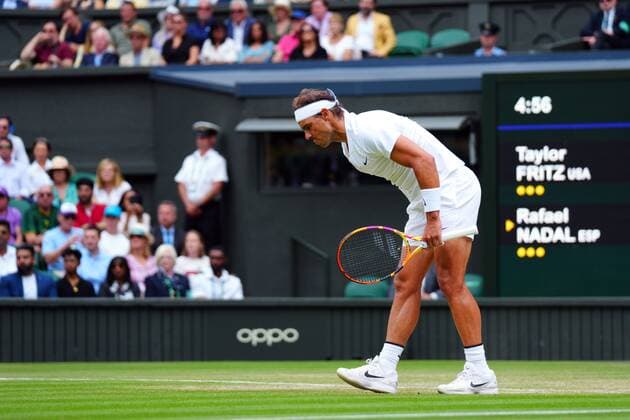 Mandatory Credit: Photo by Javier Garcia Shutterstock (13018042ic) Rafael Nadal in pain during his quarter-final match Wimbledon Tennis Championships, Day 10, The All England Lawn Tennis and Croquet Club, London, UK - 06 Jul 2022 Wimbledon Tennis Championships, Day 10, The All England Lawn Tennis and Croquet Club, London, UK - 06 Jul 2022  Copyright: xJavierxGarcia Shutterstockx 13018042ic