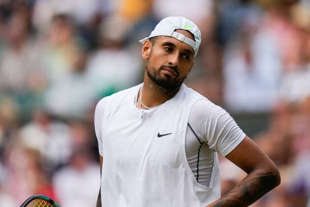 Mandatory Credit: Photo by Dave Shopland Shutterstock (13018039ay) Nick Kyrgios reacts during his quarter final match Wimbledon Tennis Championships, Day 10, The All England Lawn Tennis and Croquet Club, London, UK - 06 Jul 2022 Wimbledon Tennis Championships, Day 10, The All England Lawn Tennis and Croquet Club, London, UK - 06 Jul 2022  Copyright: xDavexShopland Shutterstockx 13018039ay