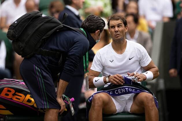 Mandatory Credit: Photo by Ella Ling Shutterstock (13018040bu) Rafael Nadal sees the physio during his quarter final match Wimbledon Tennis Championships, Day 10, The All England Lawn Tennis and Croquet Club, London, UK - 06 Jul 2022 Wimbledon Tennis Championships, Day 10, The All England Lawn Tennis and Croquet Club, London, UK - 06 Jul 2022  Copyright: xEllaxLing Shutterstockx 13018040bu
