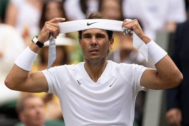 Mandatory Credit: Photo by Ella Ling Shutterstock (13018040by) Rafael Nadal during his quarter final match Wimbledon Tennis Championships, Day 10, The All England Lawn Tennis and Croquet Club, London, UK - 06 Jul 2022 Wimbledon Tennis Championships, Day 10, The All England Lawn Tennis and Croquet Club, London, UK - 06 Jul 2022  Copyright: xEllaxLing Shutterstockx 13018040by
