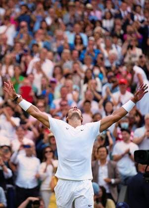 Mandatory Credit: Photo by Javier Garcia Shutterstock (13018042lg) Rafael Nadal celebrates victory in his quarter-final match Wimbledon Tennis Championships, Day 10, The All England Lawn Tennis and Croquet Club, London, UK - 06 Jul 2022 Wimbledon Tennis Championships, Day 10, The All England Lawn Tennis and Croquet Club, London, UK - 06 Jul 2022  Copyright: xJavierxGarcia Shutterstockx 13018042lg