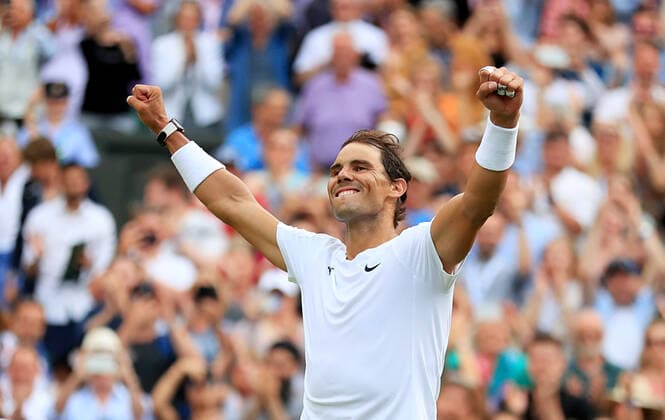 (220707) -- LONDON, July 7, 2022 -- Rafael Nadal of Spain celebrates after winning the men s singles quarter-final match against Taylor Fritz of the United States at Wimbledon Tennis Championship in London, Britain, on July 6, 2022. ) (SP)BRITAIN-LONDON-TENNIS-WIMBLEDON-MEN S SINGLES-QUARTERFINALS LixYing 