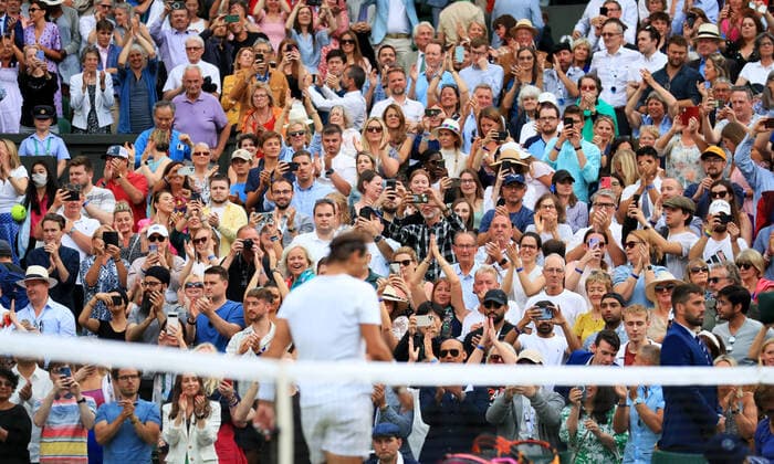 (220707) -- LONDON, July 7, 2022 -- Spectators applaud Rafael Nadal of Spain after he won the men s singles quarter-final match against Taylor Fritz of the United States at Wimbledon Tennis Championship in London, Britain, on July 6, 2022. ) (SP)BRITAIN-LONDON-TENNIS-WIMBLEDON-MEN S SINGLES-QUARTERFINALS LixYing 