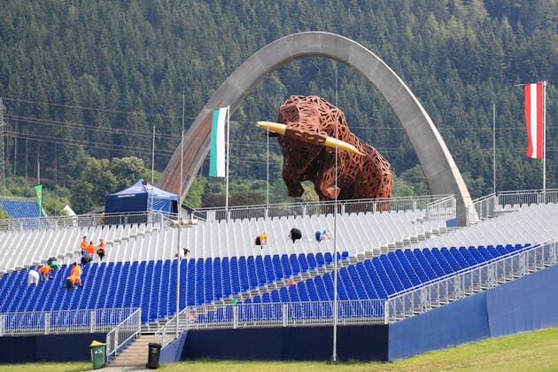 FORMULA 1 - GP of Austria 2022 SPIELBERG,AUSTRIA,07.JUL.22 - MOTORSPORTS, FORMULA 1 - Grand Prix of Austria, Red Bull Ring, preview. Image shows a sculpture of a bulla and a grand stand.  GEPAxpictures xMarioxBuehner