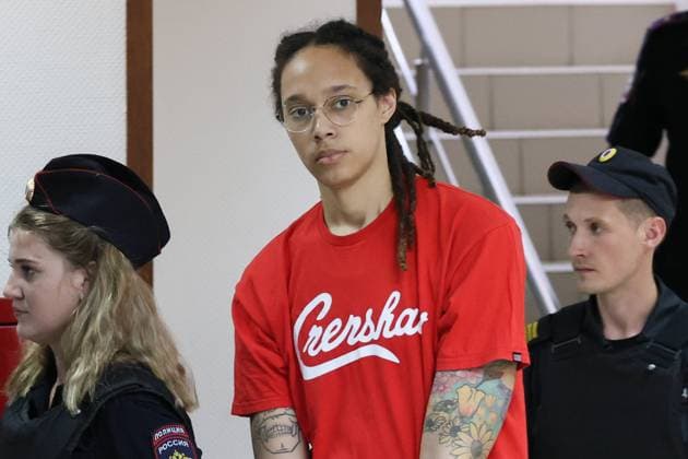 MOSCOW REGION, RUSSIA â€“ JULY 7, 2022: US Olympic champion basketball player Brittney Griner (C) charged with drug smuggling arrives for a hearing at the Khimki City Court. She is remanded in custody until December 20 for attempting to smuggle hash oil through Sheremetyevo International Airport. Sergei Savostyanov TASS  0162403862st