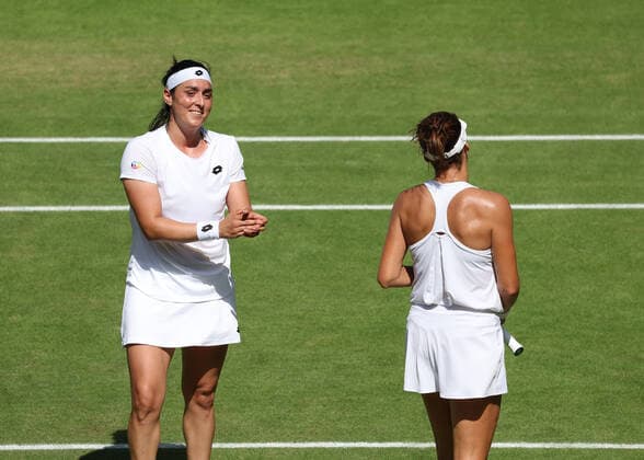 7th July 2022, All England Lawn Tennis and Croquet Club, London, England; Wimbledon Tennis tournament; Ons Jabeur (TUN) applauding Tatjana Maria (GER) after defeating the German in 3 sets to reach the final  ActionPlus12405682 JohnxPatrickxFletcher