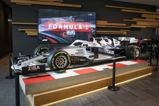 FORMULA 1 - GP of Austria 2022 SPIELBERG,AUSTRIA,07.JUL.22 - MOTORSPORTS, FORMULA 1 - Grand Prix of Austria, Red Bull Ring, preview. Image shows a Alpha Tauri f1 car at the welcome center.  GEPAxpictures xManfredxBinder