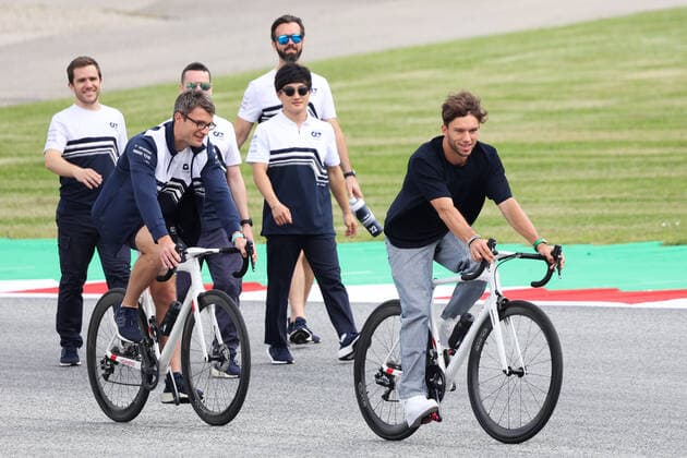 F1 Austrian Grand Prix Previews Pierre Gasly of AlphaTauri-RBPT rides a bike and Yuki Tsunoda of AlphaTauri-RBPT walk the track ahead of the Formula 1 Austrian Grand Prix at Red Bull Ring in Spielberg, Austria on July 7, 2022. Spielberg Austria  Copyright: xJakubxPorzyckix originalFilename:porzycki-f1austri220707_npczp.jpg