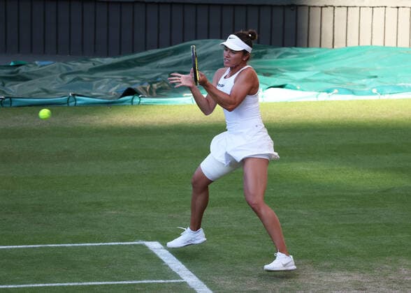 7th July 2022, All England Lawn Tennis and Croquet Club, London, England; Wimbledon Tennis tournament; Desirae Krawczyk (USA) plays a forehand to Matthew Ebden (AUS) as they retain their mixed doubles title  ActionPlus12405764 JohnxPatrickxFletcher