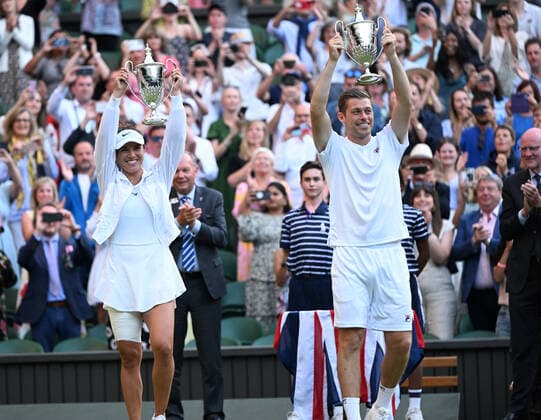 Tennis Championships - Week One - Day Eleven - All England Lawn Tennis Club, Wimbledon - Thursday 7th July 2022 Mixed Doubles Final - Centre Court Neal Skupski (GBR) and Desirae Krawczyk (USA) v Matthew Ebden and Samantha Sposur (AUS) Winners - Neal Skupski (GBR) and Desirae Krawczyk (USA) with their trophies 