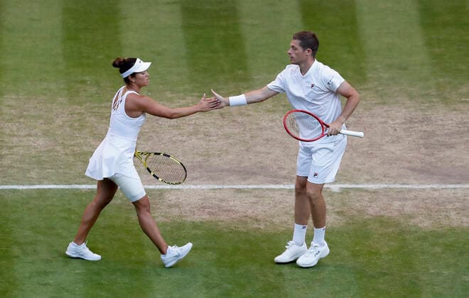 (220708) -- LONDON, July 8, 2022 -- Neal Skupski (R) of Great Britain and Desirae Krawczyk of the United States celebrate during the mixed doubles final against Matthew Ebden Samantha Stosur of Australia at Wimbledon Tennis Championship in London, Britain, on July 7, 2022. ) (SP)BRITAIN-LONDON-TENNIS-WIMBLEDON-MIXED DOUBLES-FINAL HanxYan 