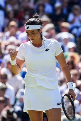 (220708) -- LONDON, July 8, 2022 -- Ons Jabeur of Tunisia celebrates during the women s singles semifinal match against Tatjana Maria of Germany at Wimbledon Tennis Championship in London, Britain, on July 7, 2022. (Photo by Xinhua) (SP)BRITAIN-LONDON-TENNIS-WIMBLEDON-WOMEN S SINGLES-SEMIFINALS ShixTang 