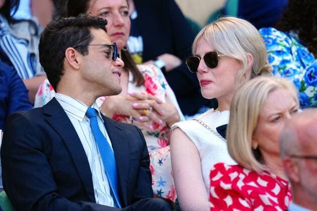 Mandatory Credit: Photo by Javier Garcia Shutterstock (13018051aa) Rami Malek and Lucy Boynton in the Royal Box on Centre Court Wimbledon Tennis Championships, Day 12, The All England Lawn Tennis and Croquet Club, London, UK - 08 Jul 2022 Wimbledon Tennis Championships, Day 12, The All England Lawn Tennis and Croquet Club, London, UK - 08 Jul 2022  Copyright: xJavierxGarcia Shutterstockx 13018051aa