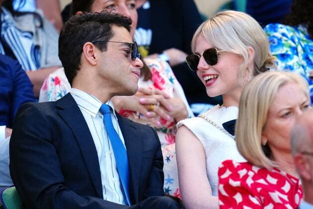 Mandatory Credit: Photo by Javier Garcia Shutterstock (13018051v) Rami Malek and Lucy Boynton in the Royal Box on Centre Court Wimbledon Tennis Championships, Day 12, The All England Lawn Tennis and Croquet Club, London, UK - 08 Jul 2022 Wimbledon Tennis Championships, Day 12, The All England Lawn Tennis and Croquet Club, London, UK - 08 Jul 2022  Copyright: xJavierxGarcia Shutterstockx 13018051v