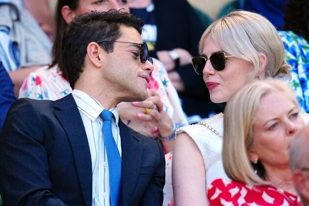 Mandatory Credit: Photo by Javier Garcia Shutterstock (13018051x) Rami Malek and Lucy Boynton in the Royal Box on Centre Court Wimbledon Tennis Championships, Day 12, The All England Lawn Tennis and Croquet Club, London, UK - 08 Jul 2022 Wimbledon Tennis Championships, Day 12, The All England Lawn Tennis and Croquet Club, London, UK - 08 Jul 2022  Copyright: xJavierxGarcia Shutterstockx 13018051x