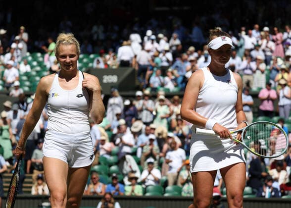 8th July 2022, All England Lawn Tennis and Croquet Club, London, England; Wimbledon Tennis tournament; Barbora Krejcikova (CZE) and Katerina Siniakova (CZE) celebrate after defeating Lyudmyla Kichenok (UKR) and Jelena Ostapenko (LAT) to reach the Ladies Doubles Final  ActionPlus12406004 JohnxPatrickxFletcher