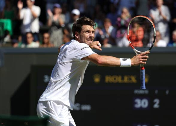 8th July 2022, All England Lawn Tennis and Croquet Club, London, England; Wimbledon Tennis tournament; Cameron Norrie (GBR) celebrates towards the crowd after winning the first set 6-2 versus Novak& xa0;Djokovic (SRB)  ActionPlus12406005 JohnxPatrickxFletcher