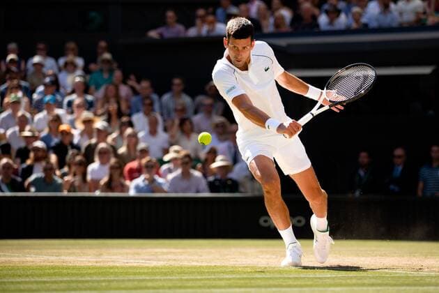 Mandatory Credit: Photo by Ella Ling Shutterstock (13018049f) Novak Djokovic during his semi-final match Wimbledon Tennis Championships, Day 12, The All England Lawn Tennis and Croquet Club, London, UK - 08 Jul 2022 Wimbledon Tennis Championships, Day 12, The All England Lawn Tennis and Croquet Club, London, UK - 08 Jul 2022  Copyright: xEllaxLing Shutterstockx 13018049f
