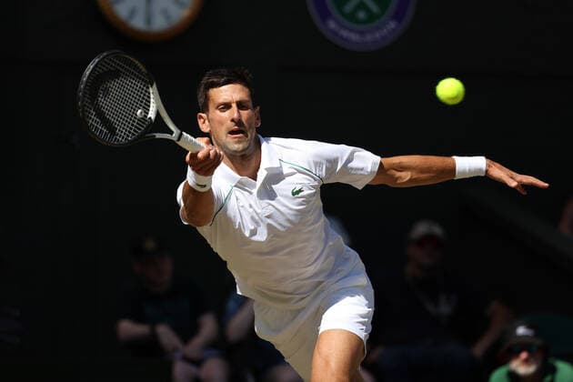 8th July 2022, All England Lawn Tennis and Croquet Club, London, England; Wimbledon Tennis tournament; Novak& xa0;Djokovic (SRB) plays a forehand to Cameron Norrie (GBR) in the mens singles semi-final match  ActionPlus12406026 JohnxPatrickxFletcher