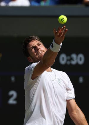 8th July 2022, All England Lawn Tennis and Croquet Club, London, England; Wimbledon Tennis tournament; Cameron Norrie (GBR) serves to Novak& xa0;Djokovic (SRB) in the mens singles semi-final match  ActionPlus12406050 JohnxPatrickxFletcher
