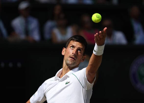 8th July 2022, All England Lawn Tennis and Croquet Club, London, England; Wimbledon Tennis tournament; Novak& xa0;Djokovic (SRB) serves to Cameron Norrie (GBR) in the mens singles semi-final match  ActionPlus12406033 JohnxPatrickxFletcher