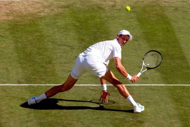 Mandatory Credit: Photo by Ella Ling Shutterstock (13018049o) Novak Djokovic during his semi-final match Wimbledon Tennis Championships, Day 12, The All England Lawn Tennis and Croquet Club, London, UK - 08 Jul 2022 Wimbledon Tennis Championships, Day 12, The All England Lawn Tennis and Croquet Club, London, UK - 08 Jul 2022  Copyright: xEllaxLing Shutterstockx 13018049o