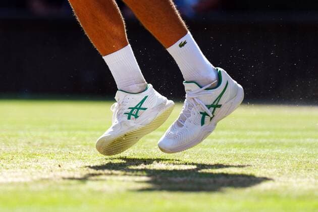 Mandatory Credit: Photo by Javier Garcia Shutterstock (13018051fq) The Asics tennis shoes of Novak Djokovic during his semi-final match Wimbledon Tennis Championships, Day 12, The All England Lawn Tennis and Croquet Club, London, UK - 08 Jul 2022 Wimbledon Tennis Championships, Day 12, The All England Lawn Tennis and Croquet Club, London, UK - 08 Jul 2022  Copyright: xJavierxGarcia Shutterstockx 13018051fq