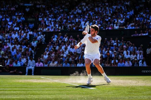 Mandatory Credit: Photo by Javier Garcia Shutterstock (13018051fz) Dust kicks off the grass from Cameron Norrie during his semi-final match Wimbledon Tennis Championships, Day 12, The All England Lawn Tennis and Croquet Club, London, UK - 08 Jul 2022 Wimbledon Tennis Championships, Day 12, The All England Lawn Tennis and Croquet Club, London, UK - 08 Jul 2022  Copyright: xJavierxGarcia Shutterstockx 13018051fz